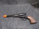 Vintage Parris Toys Johnny Reb 8 Ring Shot Cap Revolver. Fixed Price $14.95.