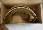 Parking Brake Shoe Set-vin: J Genuine Mopar 04560176AA. Fixed Price $141.62.