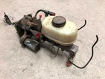 99-02 Ford F250 Super Duty Used 7.3L 4X4 Power Brake Booster Master Cylinder. Fixed Price $283.90.