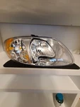 Headlight Lens-assembly Right Dorman 1590313 4857700AB; 20-6021-00; 2221-0043R. Fixed Price $55.00.
