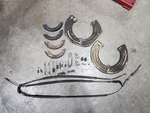 Genuine Porsche 944 Parking Brake Cable, Shoes, Springs And Dust Shields. Fixed Price $80.00.